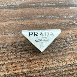 White Prada pin